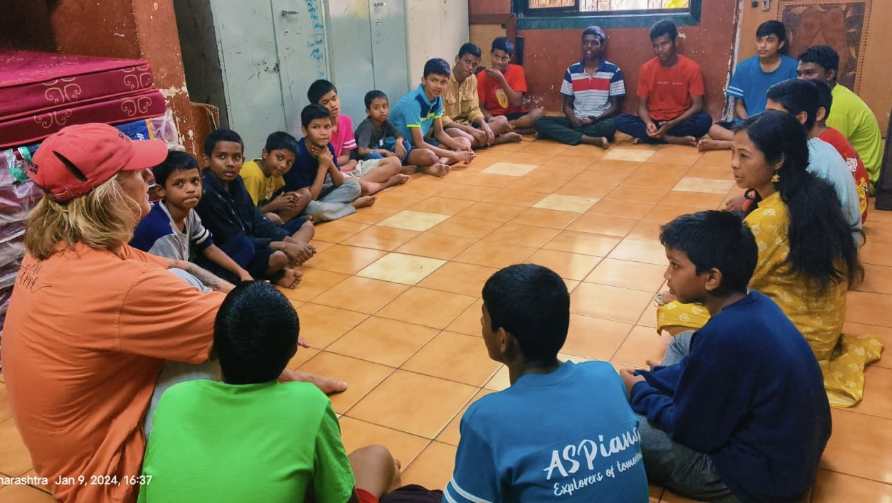 Alex teaching in India with boys