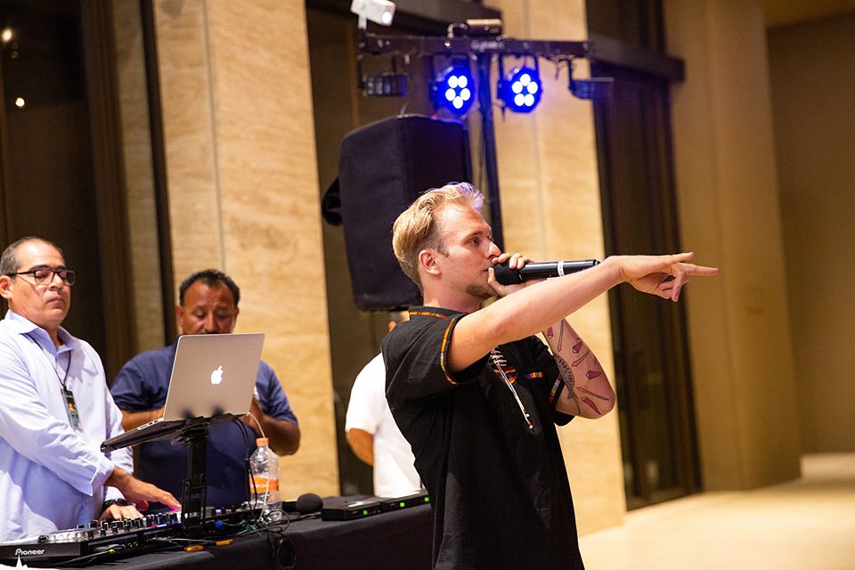 Alex speaking and gesturing